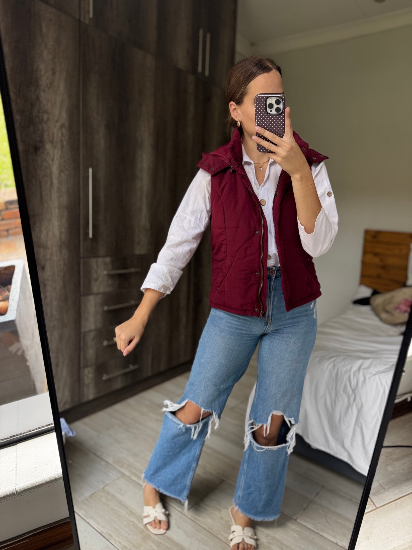 Maroon puffer vest (L)