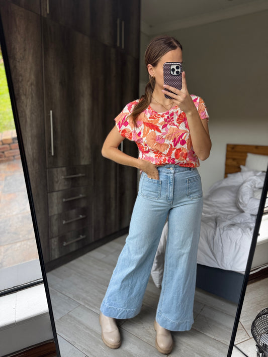 Orange floral top (M)